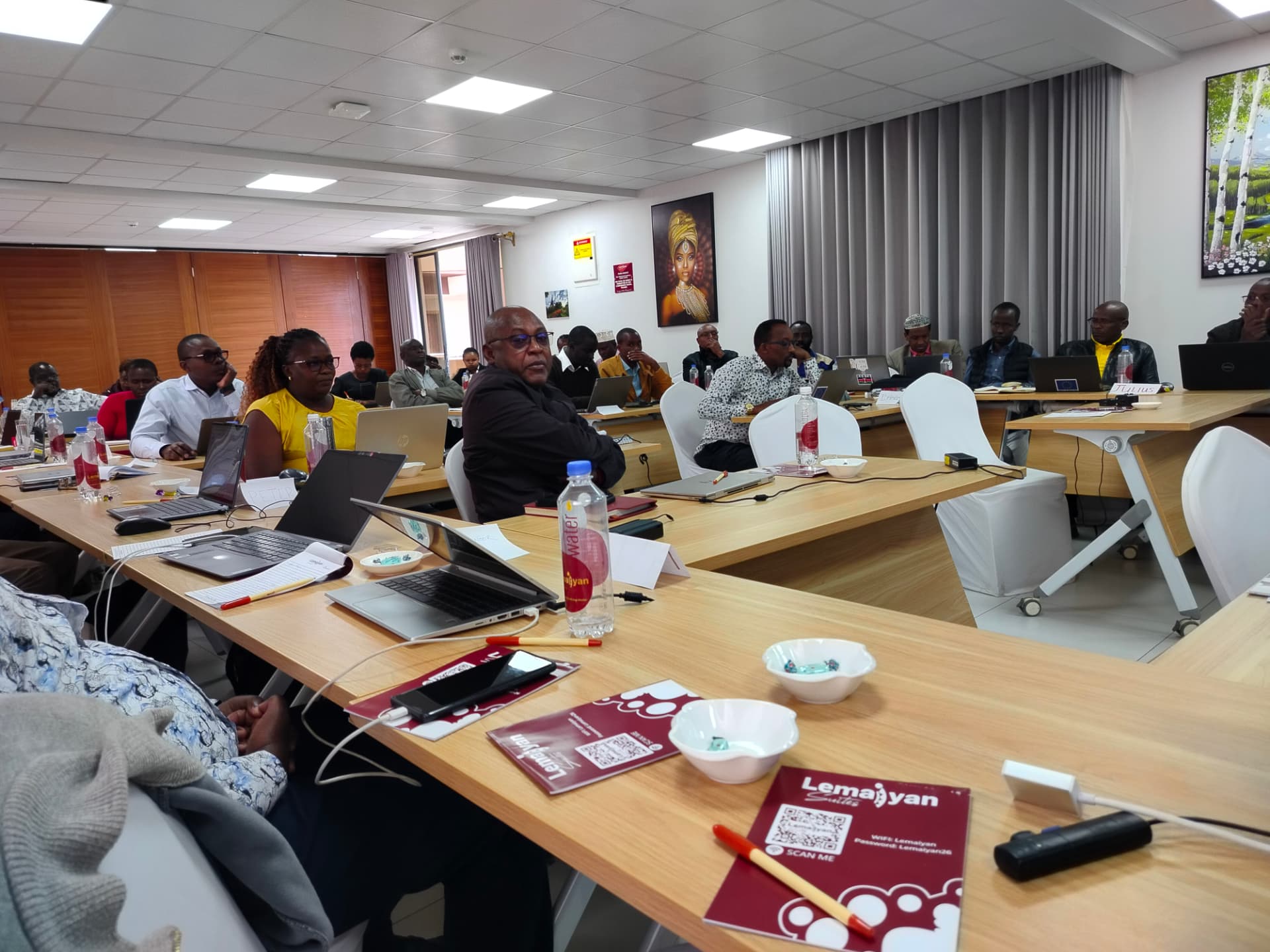 Delegates deep in discussion during a recent cohort session